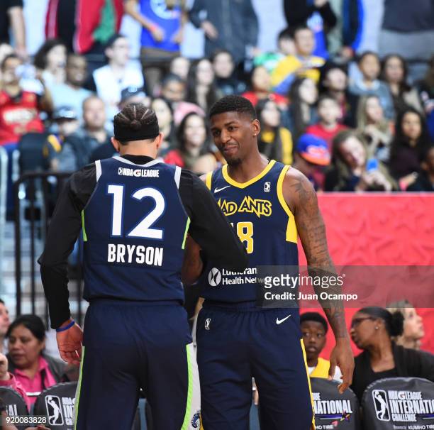 Michael Bryson of the Iowa Wolves and DeQuan Jones of the Fort Wayne Mad Ants greet each other during the 2018 NBA G-League Slam Dunk Contest as part...