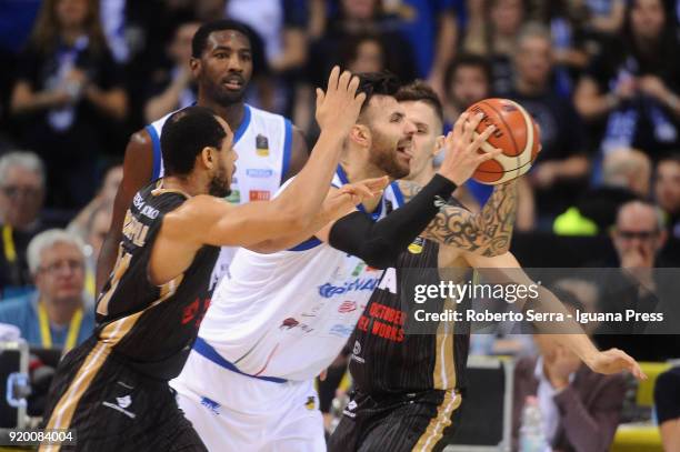 Brian Sacchetti and Dario Hunt of Germani competes with Jeremy Chappell and Maurizio Tassone of MIA during the LBA Legabasket match semifinal of...