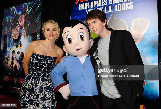 Actors Kristen Bell and Freddie Highmore arrive at the Los Angeles Premiere of "Astro Boy" held at Mann Chinese 6 on October 19, 2009 in Los Angeles,...