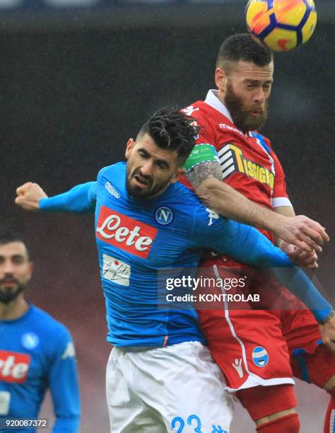 S Italian striker Mirco Antenucci heads the ball as fighting with Napoli's Albanian defender Elseid Hysaj during the Italian Serie A football match...