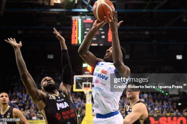 Dario Hunt of Germani competes with Jaime Smith and Charles Thonmas and Christian Burns during the LBA Legabasket match semifinal of Coppa Italia...