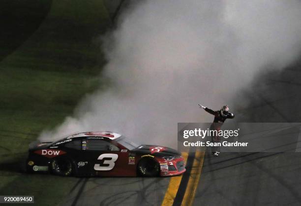 Austin Dillon, driver of the DOW Chevrolet, celebrates winning the Monster Energy NASCAR Cup Series 60th Annual Daytona 500 at Daytona International...
