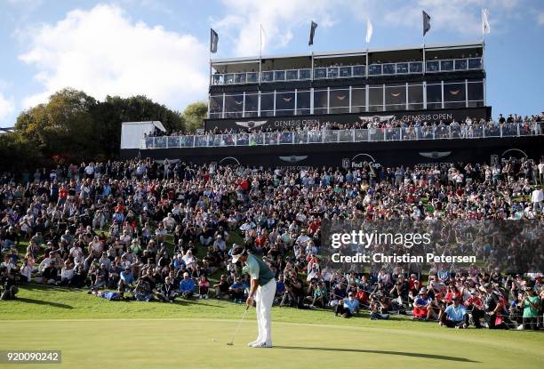 Bubba Watson putts on the 18th green during the final round of the Genesis Open at Riviera Country Club on February 18, 2018 in Pacific Palisades,...