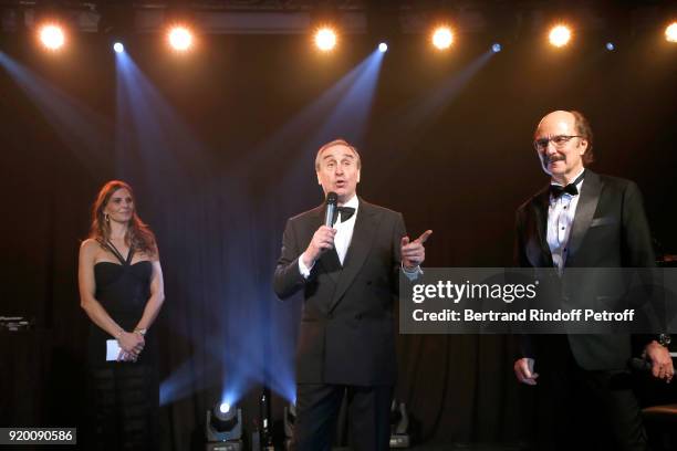 Host of the evening, Journalist at RTS Katia Hess, CEO at Christie's Europe and Asia, Francois Curiel and Jean-Francois Emery present the "Snow Night...