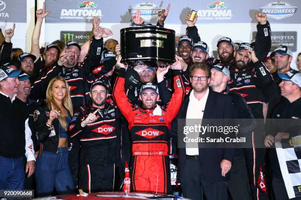 Austin Dillon, driver of the DOW Chevrolet, celebrates in Victory Lane after winning the Monster Energy NASCAR Cup Series 60th Annual Daytona 500 at...