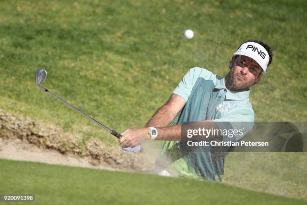 Bubba Watson plays his shot from the bunker on the 14th hole during the final round of the Genesis Open at Riviera Country Club on February 18, 2018...