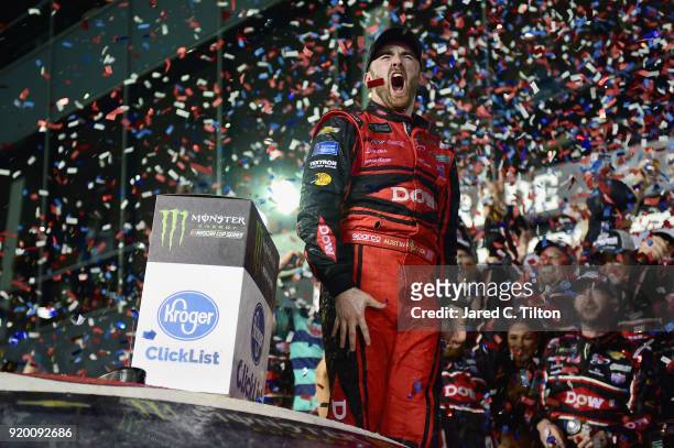 Austin Dillon, driver of the DOW Chevrolet, celebrates in Victory Lane after winning the Monster Energy NASCAR Cup Series 60th Annual Daytona 500 at...