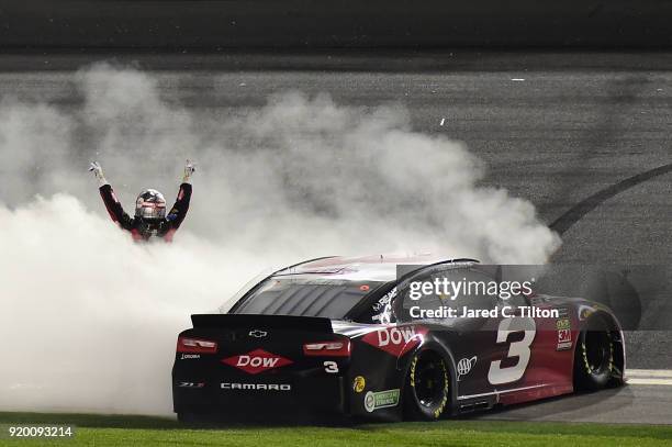 Austin Dillon, driver of the DOW Chevrolet, celebrates winning the Monster Energy NASCAR Cup Series 60th Annual Daytona 500 at Daytona International...