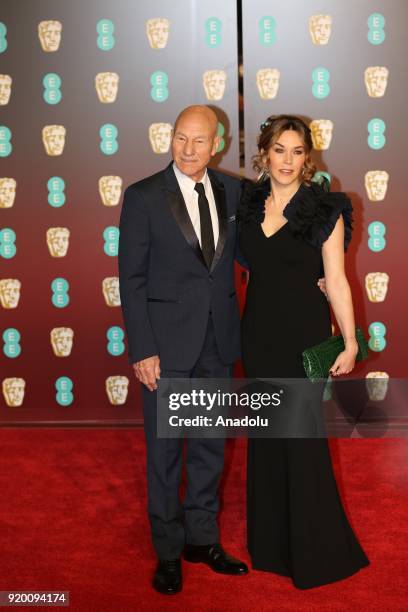 Sir Patrick Stewart and Sunny Ozell attend the EE British Academy Film Awards held at Royal Albert Hall on February 18, 2018 in London, England.