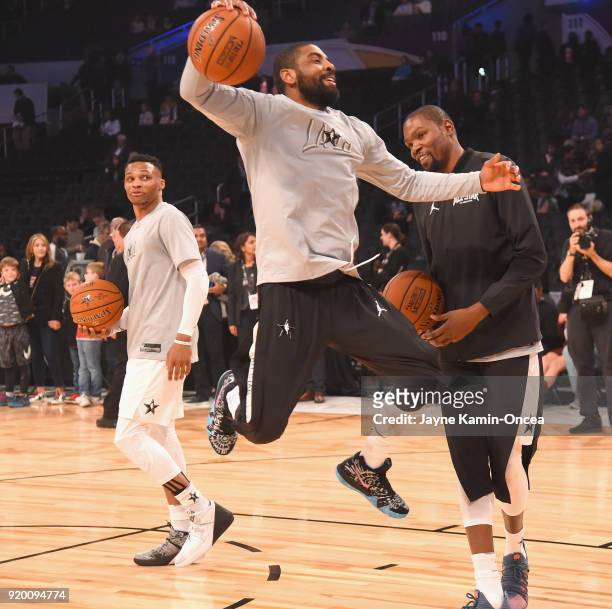 Russell Westbrook, Kyrie Irving and Kevin Durant warm up during the NBA All-Star Game 2018 at Staples Center on February 18, 2018 in Los Angeles,...