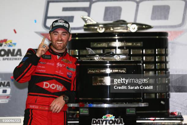 Austin Dillon, driver of the DOW Chevrolet, poses in Victory Lane after winning the Monster Energy NASCAR Cup Series 60th Annual Daytona 500 at...