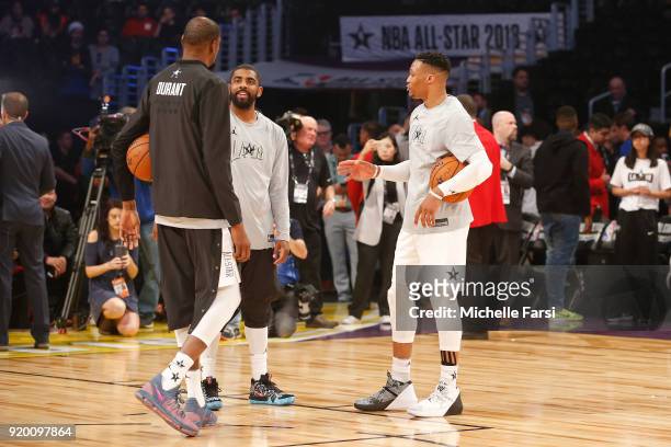 Kevin Durant, Kyrie Irving and Russell Westbrook of Team LeBron talk on the court before the NBA All-Star Game as a part of 2018 NBA All-Star Weekend...
