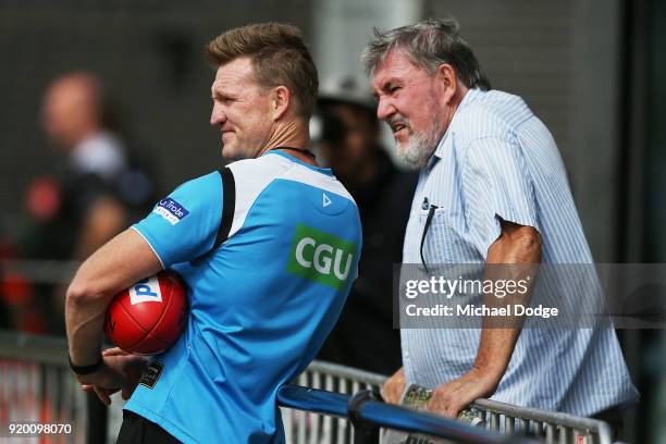 Magpies head coach Nathan Buckley looks on with his father Ray Buckley from the sideline during a Collingwood Magpies AFL training session at the...