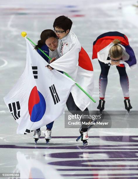 Nao Kodaira of Japan, Sang-Hwa Lee of Korea and Karolina Erbanova of the Czech Republic celebrate after winning medals during the Ladies' 500m...