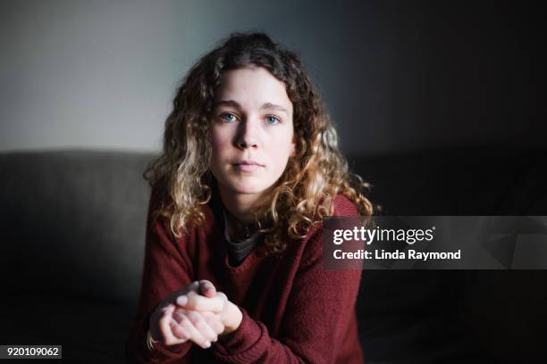 portrait of a beautiful young woman - serious face stock pictures, royalty-free photos & images