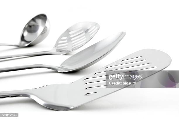 close-up of stainless kitchen utensils - spatula stock pictures, royalty-free photos & images