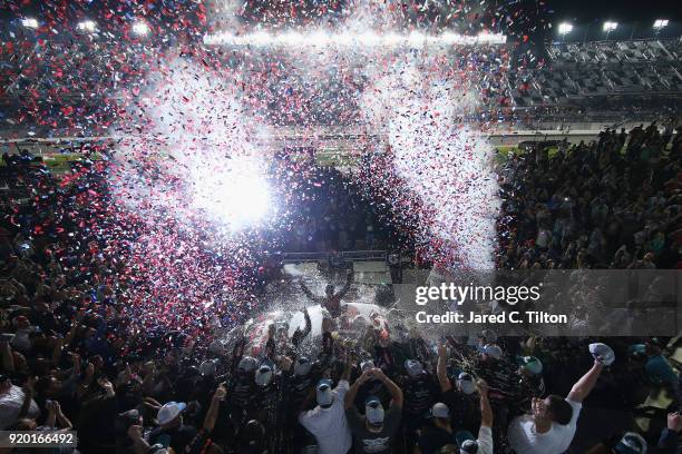 Austin Dillon, driver of the DOW Chevrolet, celebrates in Victory Lane after winning the Monster Energy NASCAR Cup Series 60th Annual Daytona 500 at...