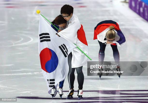 Nao Kodaira of Japan, Sang-Hwa Lee of Korea and Karolina Erbanova of the Czech Republic celebrate after winning medals during the Ladies' 500m...