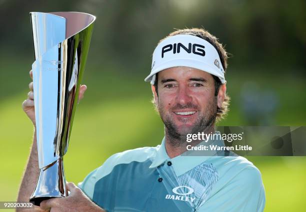 Bubba Watson poses with the trophy after winning the Genesis Open at Riviera Country Club on February 18, 2018 in Pacific Palisades, California.