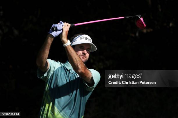 Bubba Watson plays his shot from the 13th tee during the final round of the Genesis Open at Riviera Country Club on February 18, 2018 in Pacific...