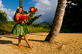 A hula dancer on a beach in Hawaii