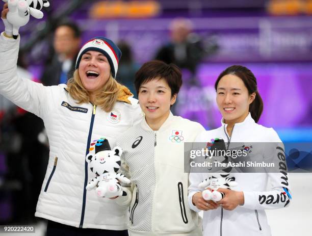 Bronze medalist Karolina Erbanova of the Czech Republic, gold medalist Nao Kodaira of Japan and silver medalist Sang-Hwa Lee of Korea celebrate on...