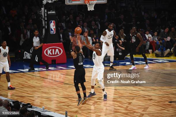 Damian Lillard of team Stephen shoots against Kevin Durant of team LeBron during the NBA All-Star Game as a part of 2018 NBA All-Star Weekend at...