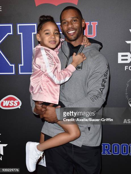 Football player Victor Cruz and daughter Kennedy Cruz attends ROOKIE USA Fashion Show at Milk Studios on February 15, 2018 in Los Angeles, California.