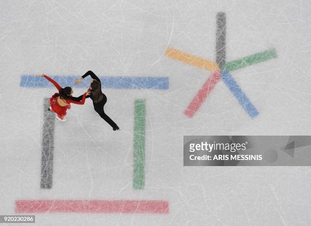 South Korea's Alexander Gamelin and South Korea's Yura Min compete in the ice dance short dance of the figure skating event during the Pyeongchang...