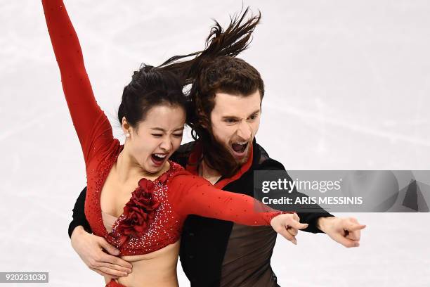 South Korea's Yura Min and South Korea's Alexander Gamelin compete in the ice dance short dance of the figure skating event during the Pyeongchang...