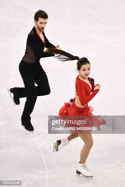 South Korea's Yura Min and South Korea's Alexander Gamelin compete in the ice dance short dance of the figure skating event during the Pyeongchang...