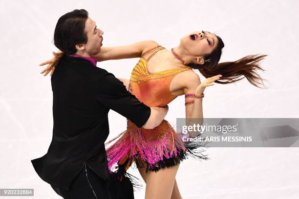 Japan's Kana Muramoto and Japan's Chris Reed compete in the ice dance short dance of the figure skating event during the Pyeongchang 2018 Winter...
