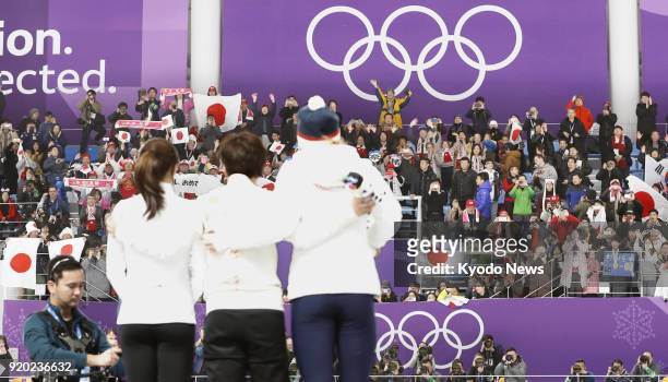 Women's 500-meter speed skating gold medalist Nao Kodaira of Japan, silver medalist Lee Sang Hwa of South Korea and bronze medalist Karolina Erbanova...