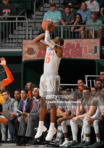 Miami guard Ja'Quan Newton shoots during a college basketball game between the Syracuse University Orange and the University of Miami Hurricanes on...