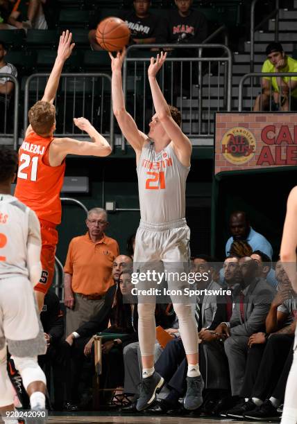 Miami forward Sam Waardenburg shoots during a college basketball game between the Syracuse University Orange and the University of Miami Hurricanes...