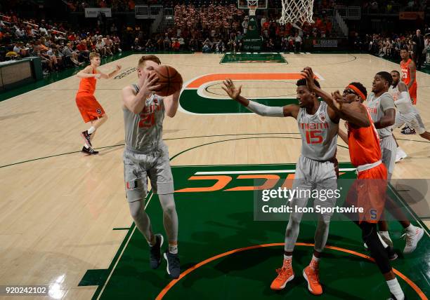 Miami forward Sam Waardenburg rebounds during a college basketball game between the Syracuse University Orange and the University of Miami Hurricanes...