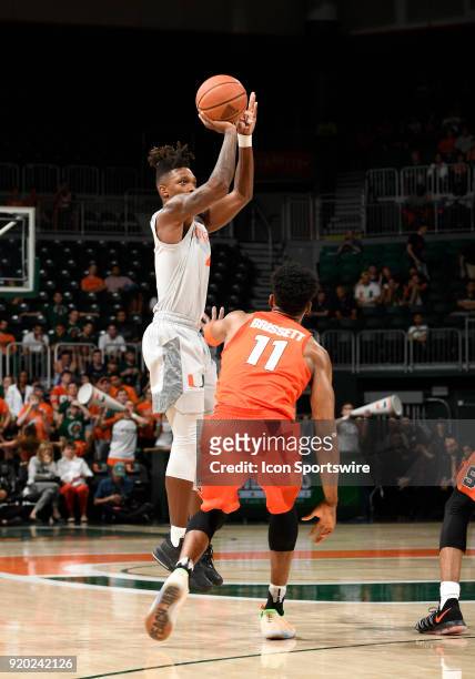 Miami guard Lonnie Walker IV shoots during a college basketball game between the Syracuse University Orange and the University of Miami Hurricanes on...