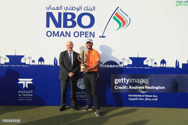 Joost Luiten of The Netherlands poses with the trophy after winning the NBO Oman Open at Al Mouj Golf on February 18, 2018 in Muscat, Oman.