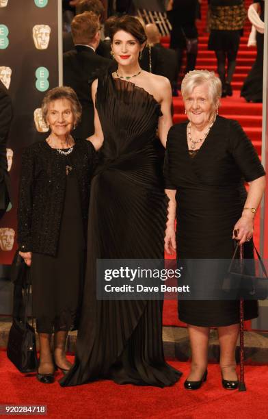 Gemma Arterton poses with Eileen Pullen and Gwen Davis at the EE British Academy Film Awards held at Royal Albert Hall on February 18, 2018 in...