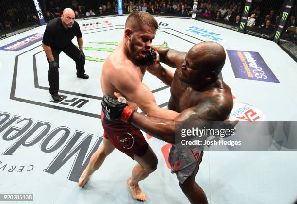Derrick Lewis punches Marcin Tybura of Poland in their heavyweight bout during the UFC Fight Night event at Frank Erwin Center on February 18, 2018...