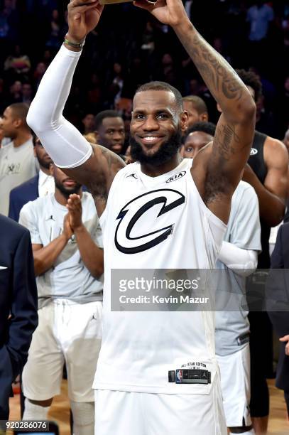 LeBron James receives the trophy for Team LeBron at the 67th NBA All-Star Game: Team LeBron Vs. Team Stephen at Staples Center on February 18, 2018...