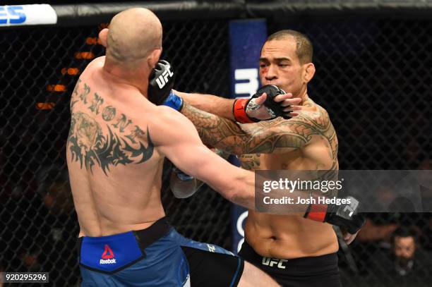 Yancy Medeiros punches Donald Cerrone in their welterweight bout during the UFC Fight Night event at Frank Erwin Center on February 18, 2018 in...