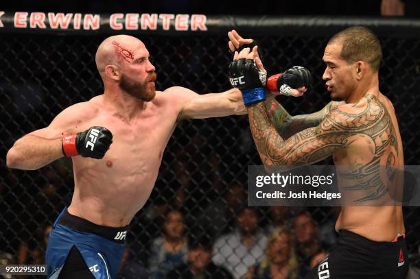 Donald Cerrone punches Yancy Medeiros in their welterweight bout during the UFC Fight Night event at Frank Erwin Center on February 18, 2018 in...