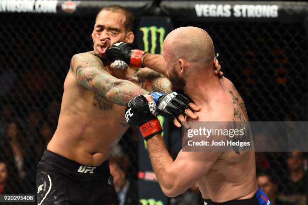 Donald Cerrone punches Yancy Medeiros in their welterweight bout during the UFC Fight Night event at Frank Erwin Center on February 18, 2018 in...