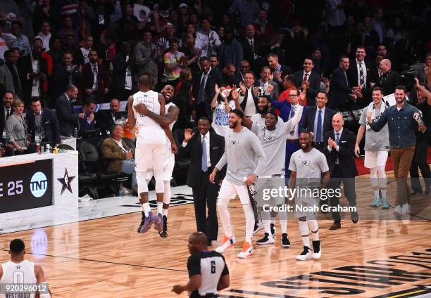 LeBron James of team LeBron celebrates with his teammates during the NBA All-Star Game as a part of 2018 NBA All-Star Weekend at STAPLES Center on...