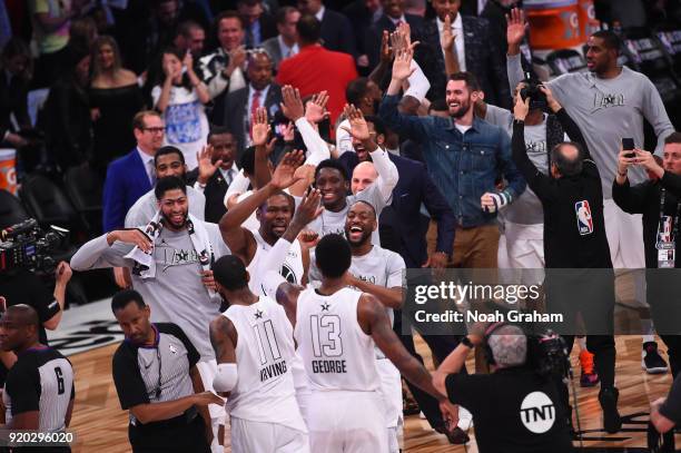 Kemba Walker and Kevin Durant of team LeBron celebrate with their teammates during the NBA All-Star Game as a part of 2018 NBA All-Star Weekend at...