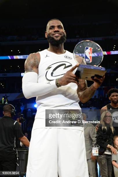 LeBron James Of Team LeBron raises the MVP award during the NBA All-Star Game as a part of 2018 NBA All-Star Weekend at STAPLES Center on February...
