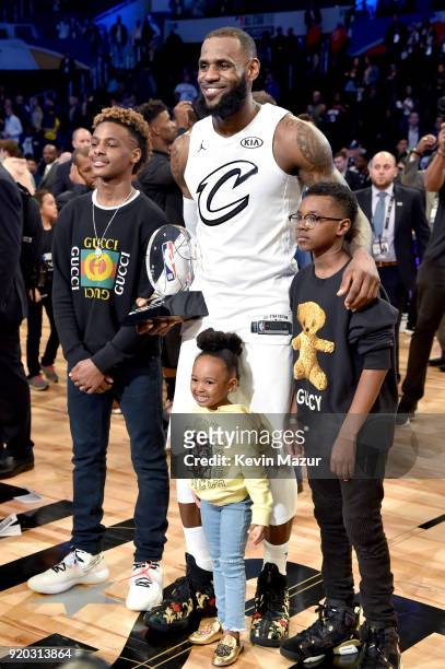 LeBron James Jr., LeBron James, Zhuri James, and Bryce Maximus James attend the 67th NBA All-Star Game: Team LeBron Vs. Team Stephen at Staples...