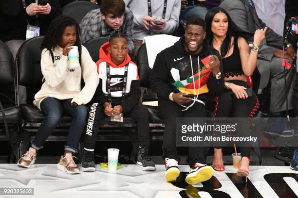 Kevin Hart, Eniko Parrish, Hendrix Hart and Heaven Hart attend The 67th NBA All-Star Game: Team LeBron Vs. Team Stephen at Staples Center on February...