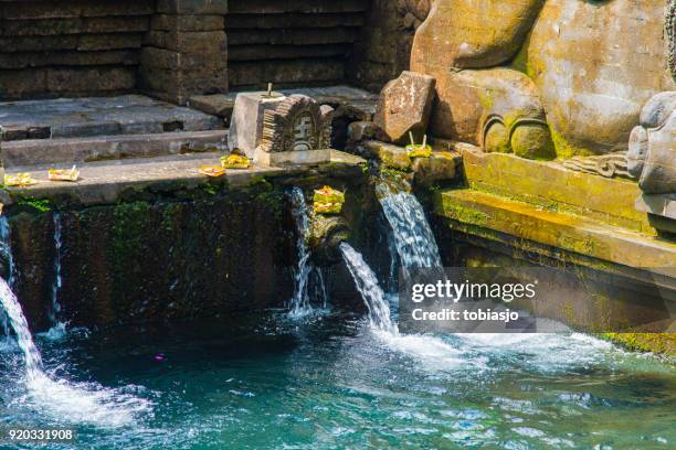 balinese hindu temple tirta empul, bali, indonesia - tirta empul temple stock pictures, royalty-free photos & images